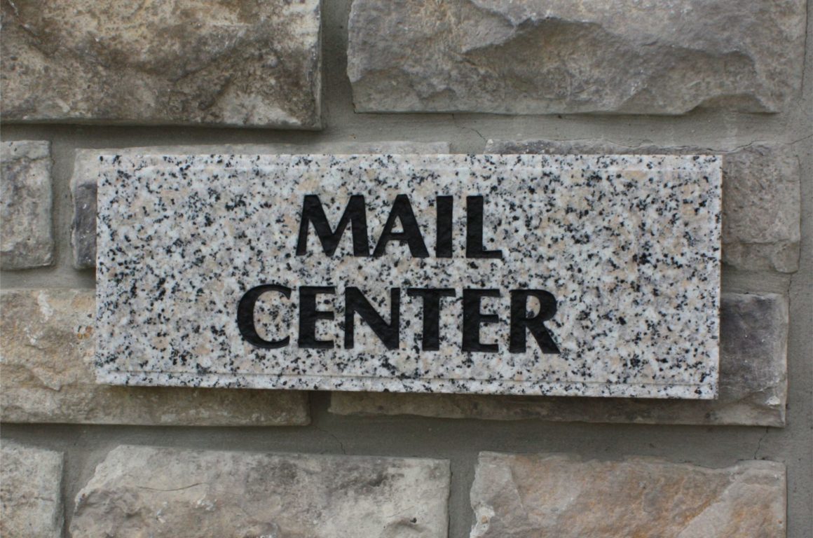 Granite mail center sign